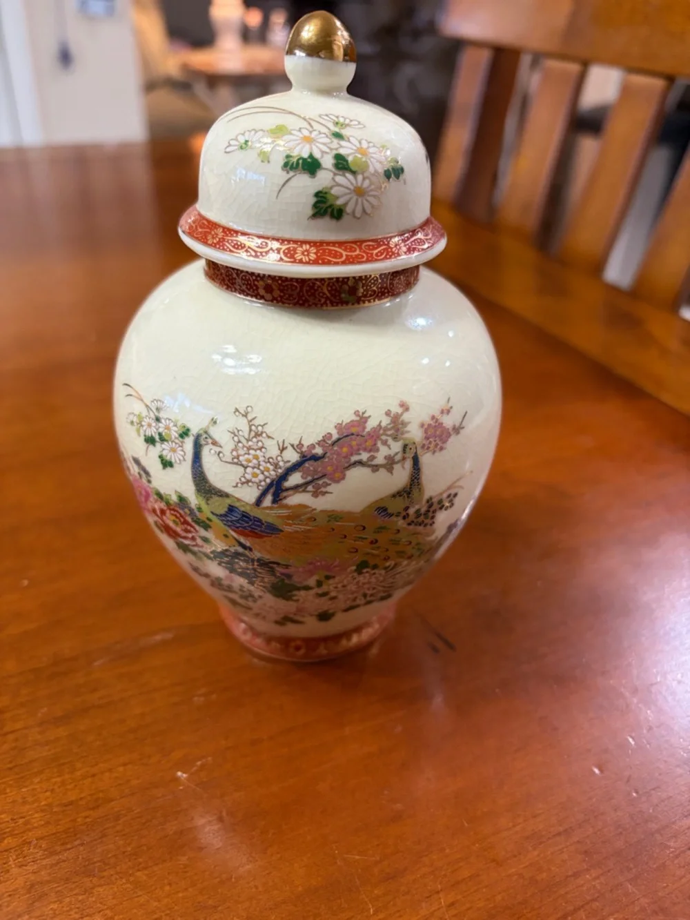 Hand-Painted Cream Porcelain Lidded Vase with Multicolor Peacock Design